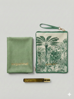 a green handbag with a palm tree design, a green towel with the word "sugarnat" printed on it, and a small bottle of "sugarnat" fragrance.