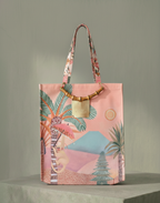 Tote bag with tropical design on a gray background