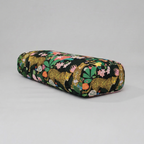 Floral-patterned cylindrical pouch on a gray background