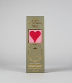 Yoga stretching strap packaging with a heart design on a gray background