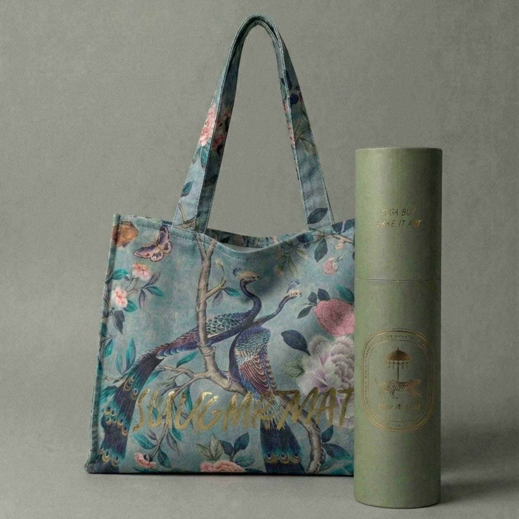 Floral tote bag and cylindrical product on a gray background