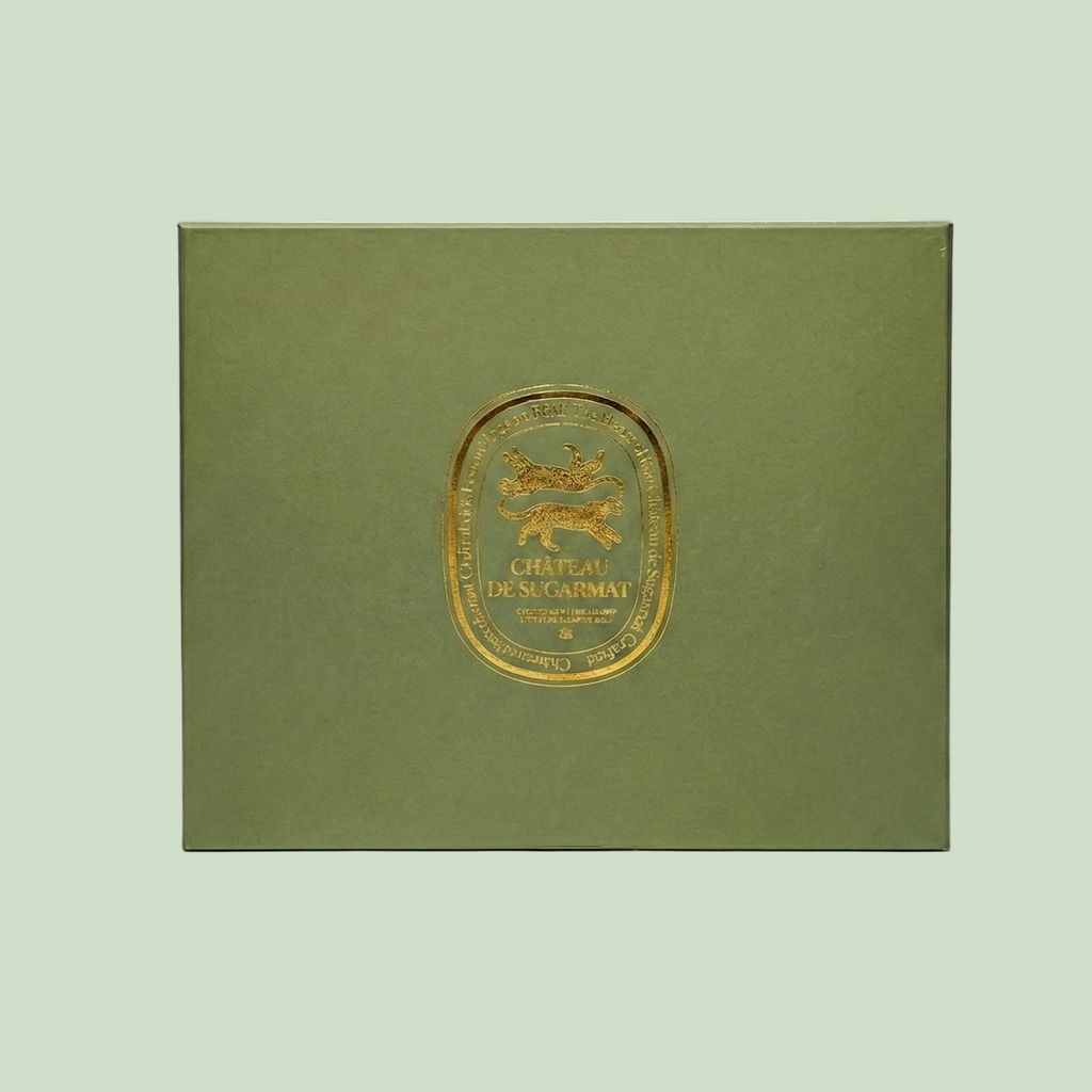Green box with a gold emblem on a white background