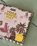Yoga travel mat packaging with animal illustrations and 'sugarmat' branding.