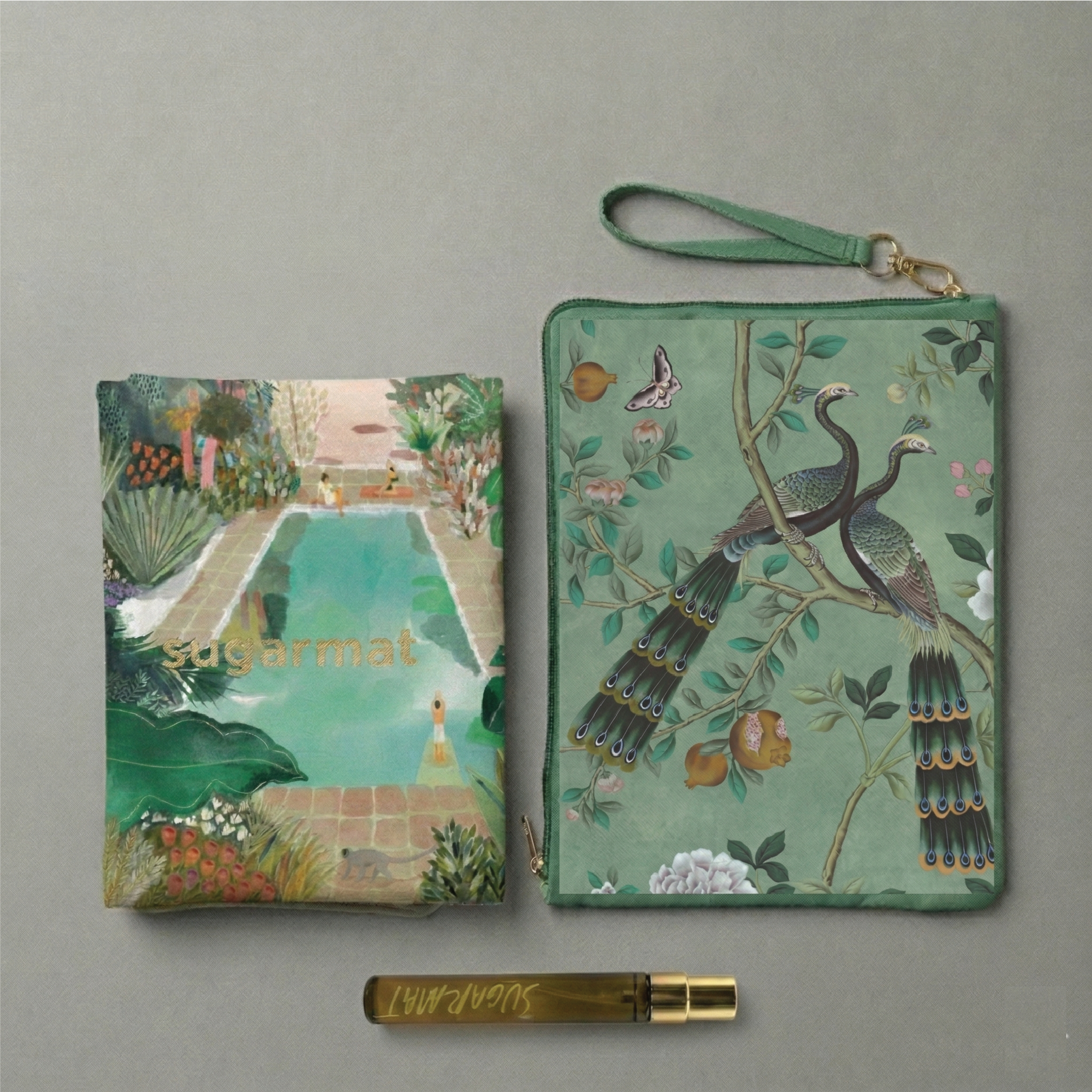 Two green handbags with artistic designs on a gray background